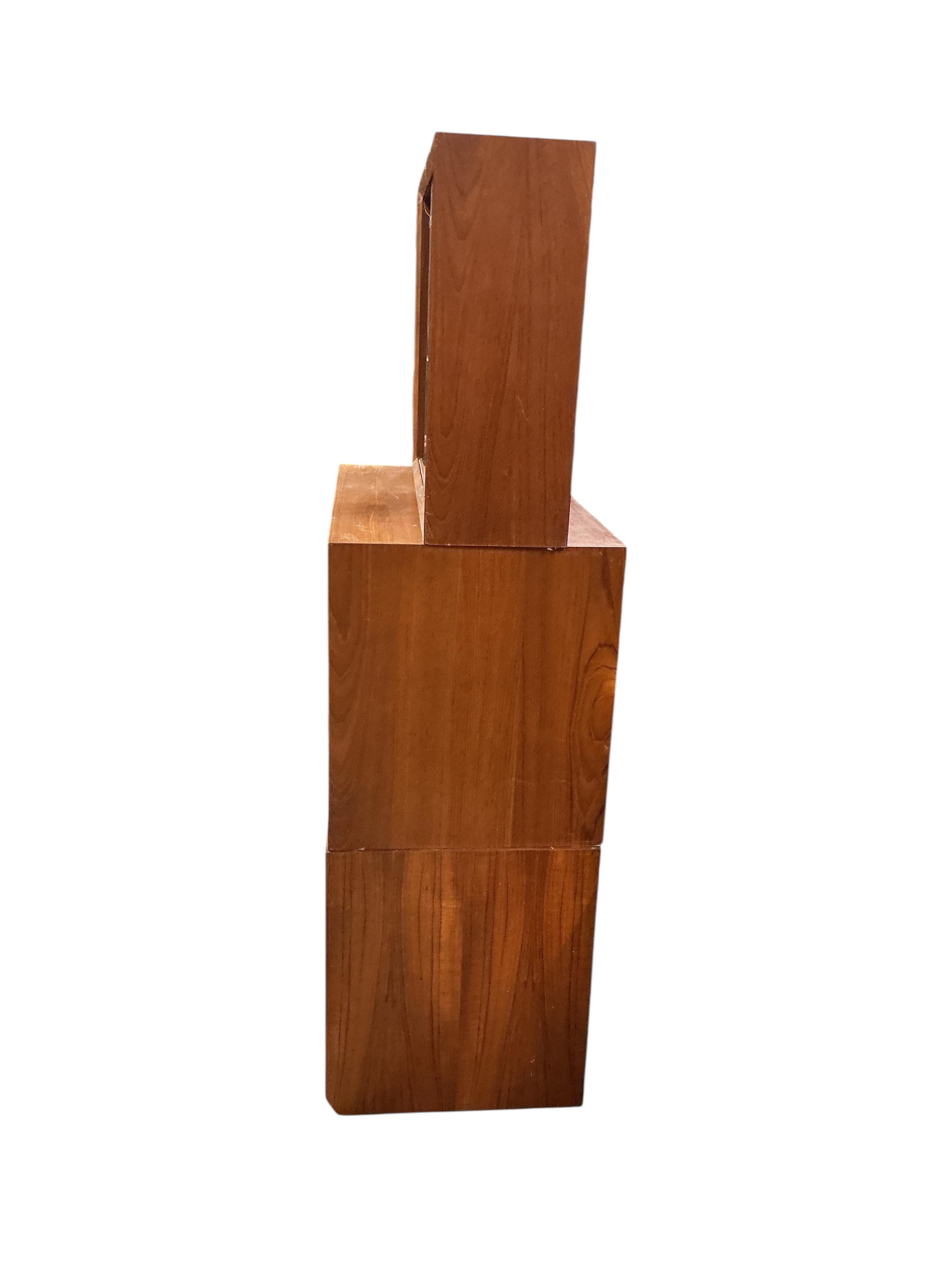A Poul Cadovius Royal System teak three section wall system, width 80cm, depth 46cm, height 159cm